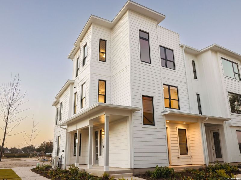 Front exterior of a new home in , San Antonio, TX, highlighting curb appeal (Image 23).