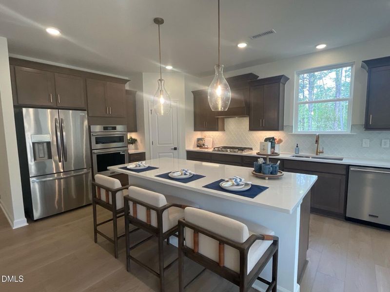 Furnished interior view inside a new home in Sage on North Main, Wake Forest (Image 11).