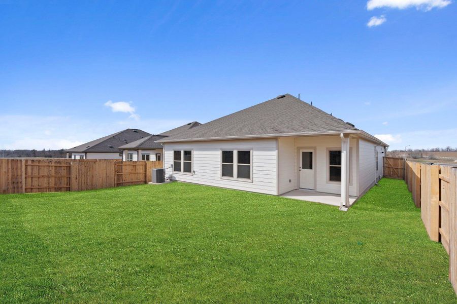 Rear of Home and Private Backyard