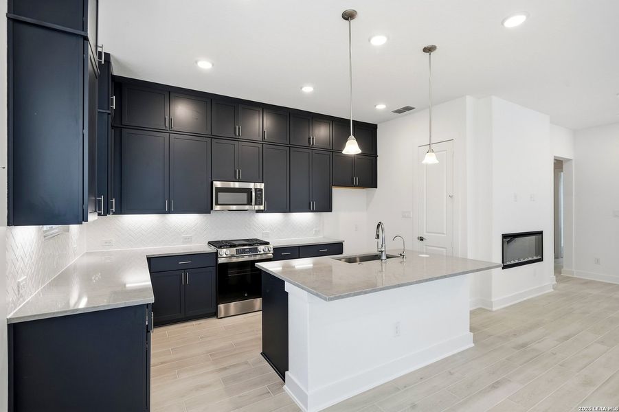 Furnished interior view inside a new home in Rose Hill, San Antonio (Image 6).