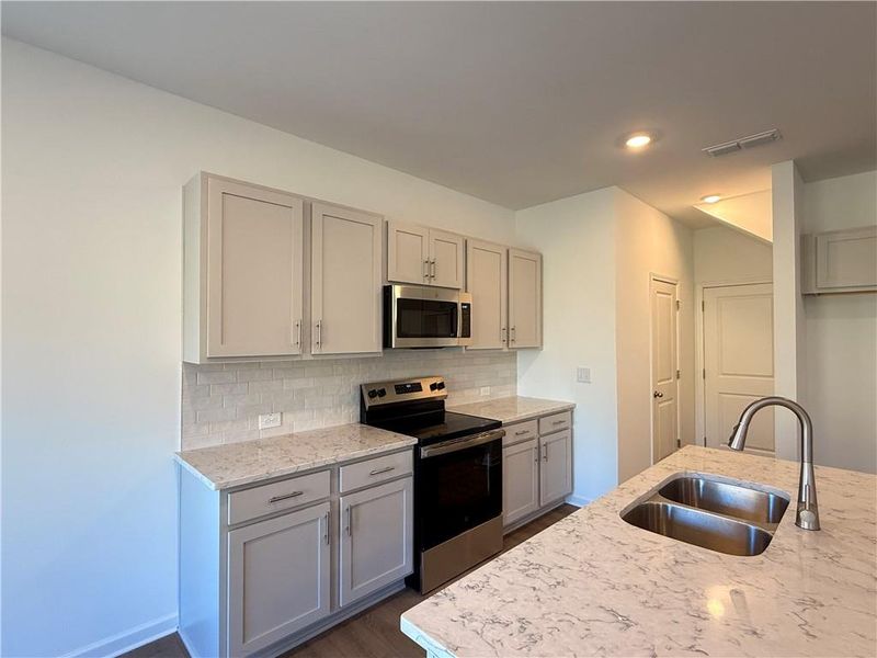 Furnished interior view inside a new home in Leydenview, Mableton (Image 9).