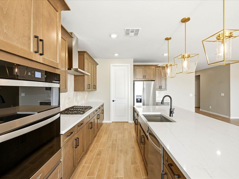 Furnished interior view inside a new home in Blossom Rock Signature Series, Apache Junction (Image 3).