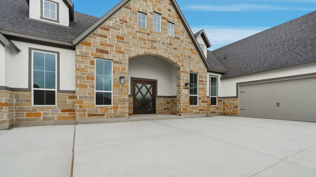 Representative exterior details of a home built from the Grant by Chesmar Homes in Heimer Estates at Garden Ridge, San Antonio (Image 3).