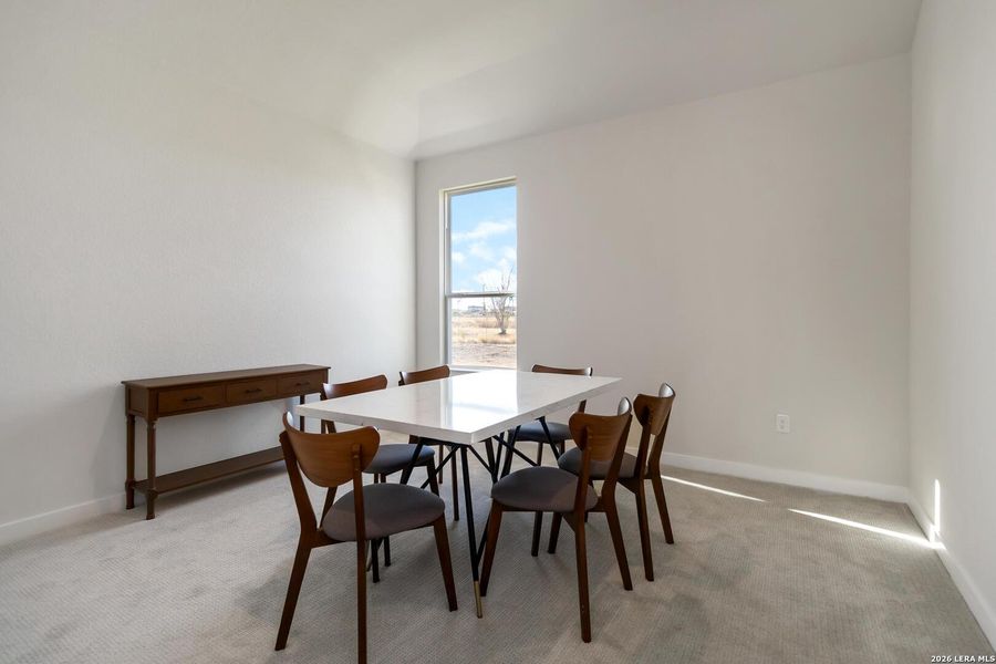 Furnished interior view inside a new home in Alamo Estates, San Antonio (Image 12).