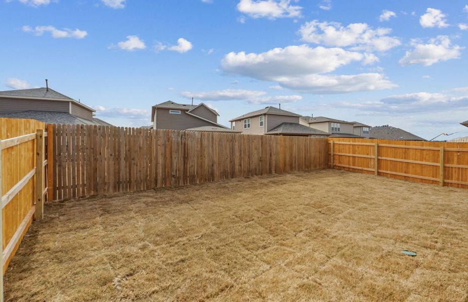 Exterior details and patio area of a home in Crosswinds, Kyle (Image 19).