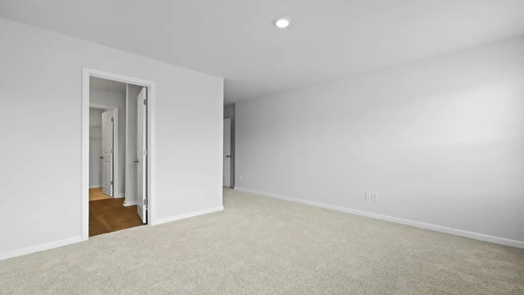 Spacious, unfurnished interior of a new home in Pine Hills Townhomes at Cane Bay, Summerville (Image 28). Spacious, unfurnished interior of a new home in Pine Hills Townhomes at Cane Bay, Summerville (Image 28).