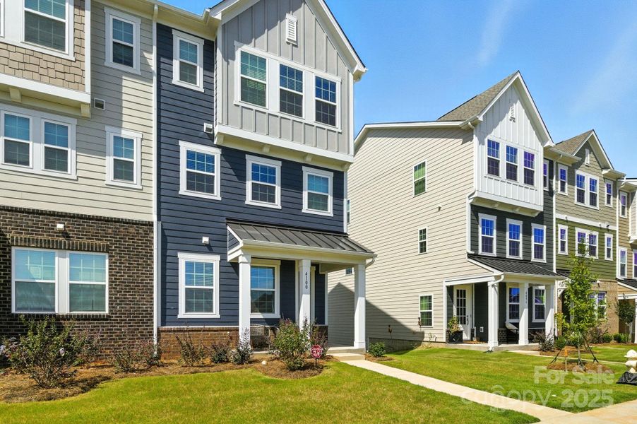 Front exterior of a new home in , Fort Mill, SC, highlighting curb appeal (Image 21).