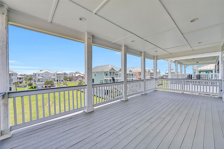 Multiple balconies give this home the true indoor outdoor lifestyle buyers are searching for in Beachside Village.  It's hard to tell from this angle but the ocean breeze and the views are amazing.  The protected HOA greenspace leads you to the convenient beach walk over.