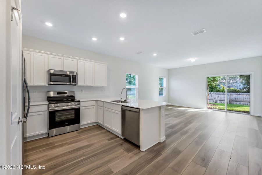 Furnished interior view inside a new home in , Orange Park (Image 6).