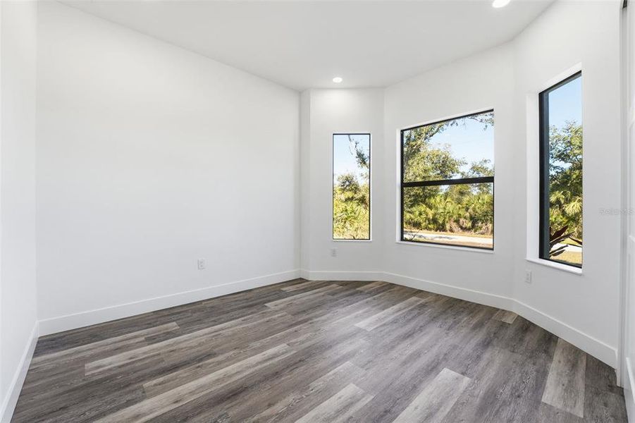 Spacious, unfurnished interior of a new home in , Port Charlotte (Image 21).