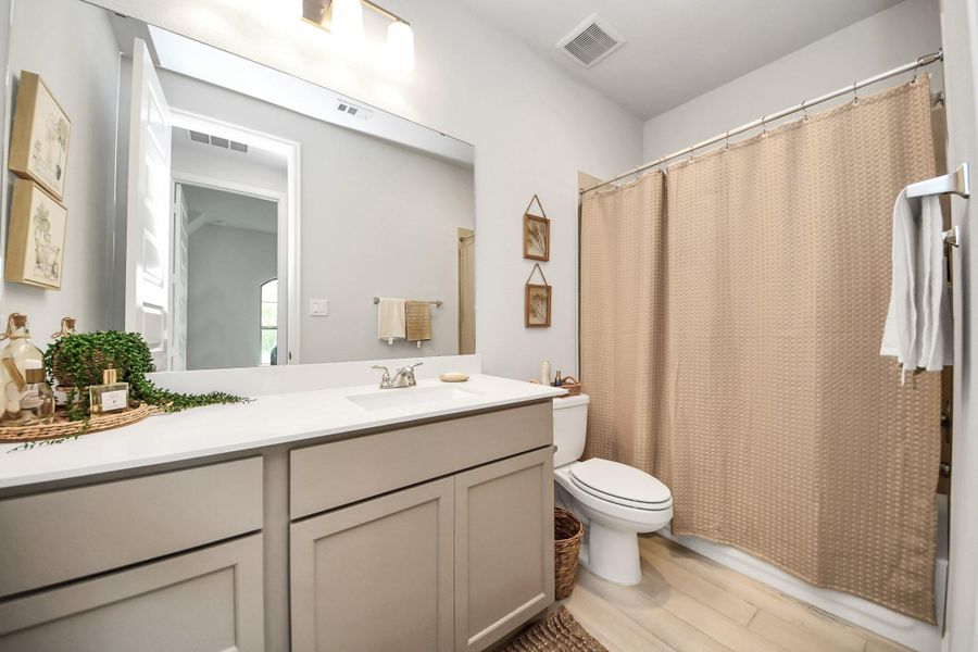 Furnished interior view inside a new home in Bridgeland, Cypress (Image 12). Furnished interior view inside a new home in Bridgeland, Cypress (Image 12).