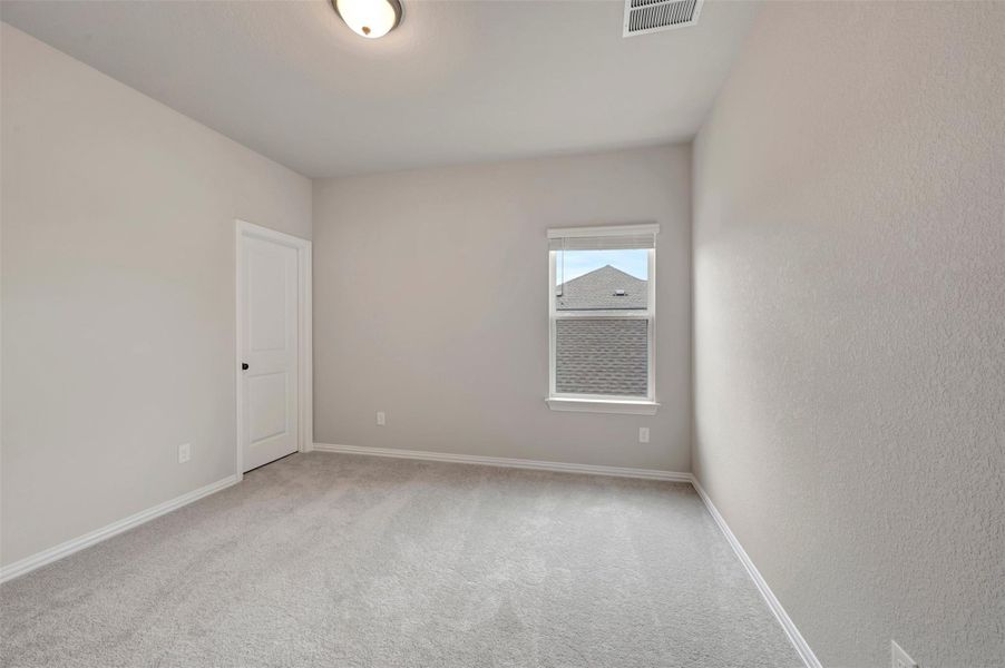 Spacious, unfurnished interior of a new home in Heritage, Dripping Springs (Image 18).