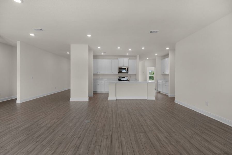 Representative unfurnished interior of a home built from the Walton by Holiday Builders in Yellow River Ranch, Milton (Image 7).