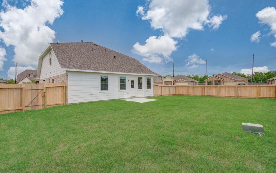 Exterior details and patio area of a home in Legends Bay, Baytown (Image 25).