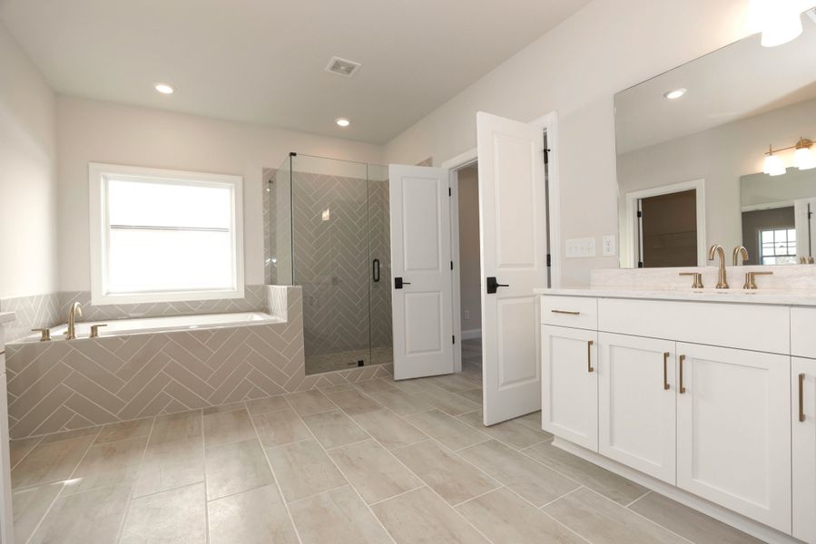 Representative furnished interior of a home built from the The Maddox by The Providence Group in Bellmoore Park, Johns Creek (Image 27).