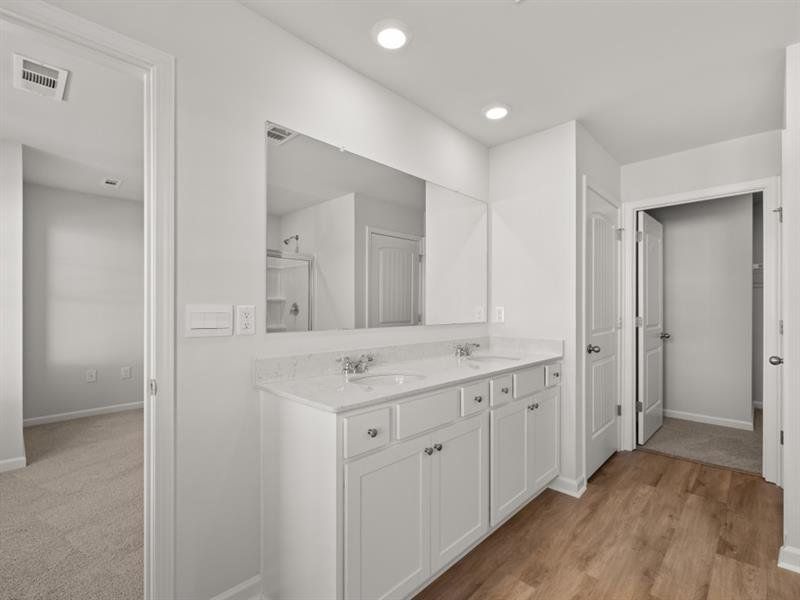 Furnished interior view inside a new home in Waypoint, Flowery Branch (Image 6).