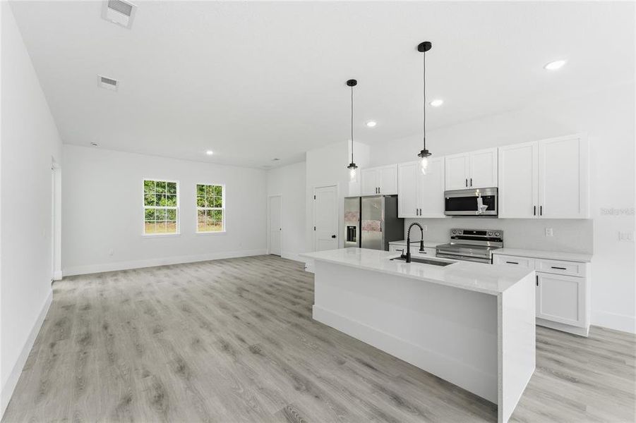 Furnished interior view inside a new home in , Dunnellon (Image 6).