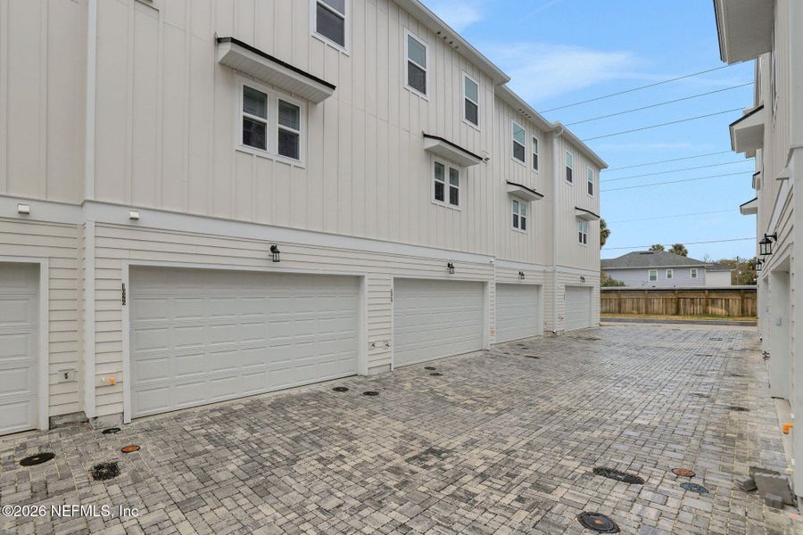 Exterior details and patio area of a home in North Beach Townhomes, Jacksonville Beach (Image 3).