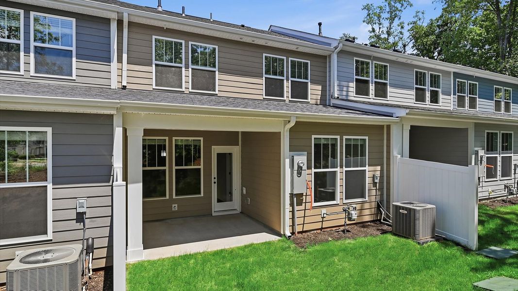 Exterior details and patio area of a home in Pelham Crossing Villas, Greenville (Image 3). Exterior details and patio area of a home in Pelham Crossing Villas, Greenville (Image 3).