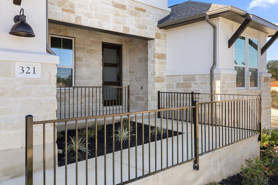 Exterior details and patio area of a home in Lariat, Liberty Hill (Image 26).
