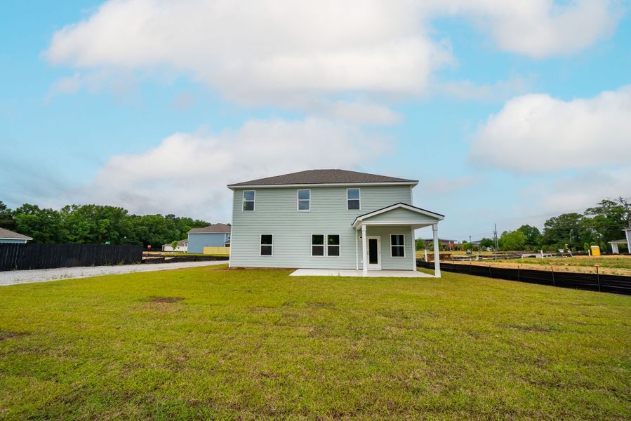 Exterior details and patio area of a home in Monroe Preserve, Chapin (Image 27).
