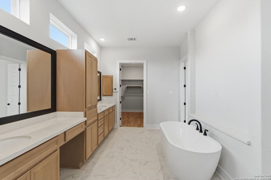 Furnished interior view inside a new home in Potranco Oaks, Castroville (Image 8).