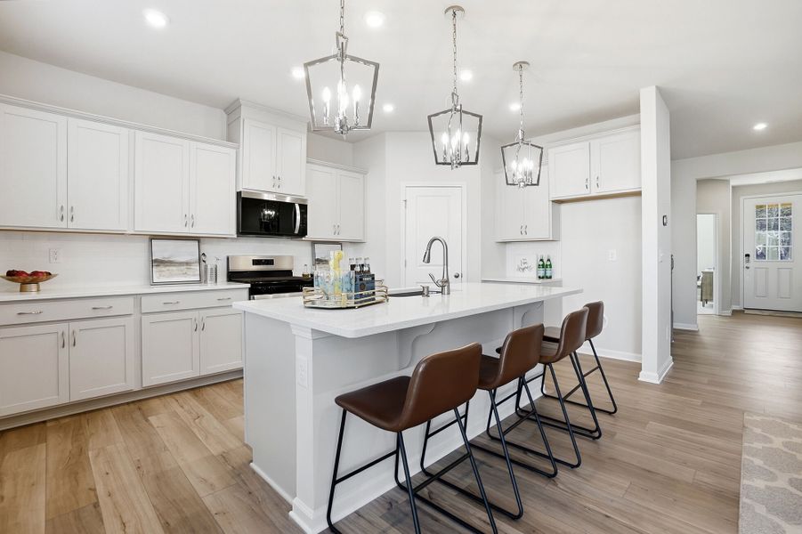 Furnished interior view inside a new home in Waxhaw Landing, Monroe (Image 11).
