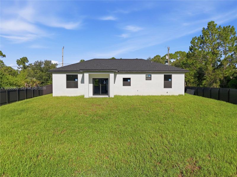 Exterior details and patio area of a home in , Lehigh Acres (Image 3).