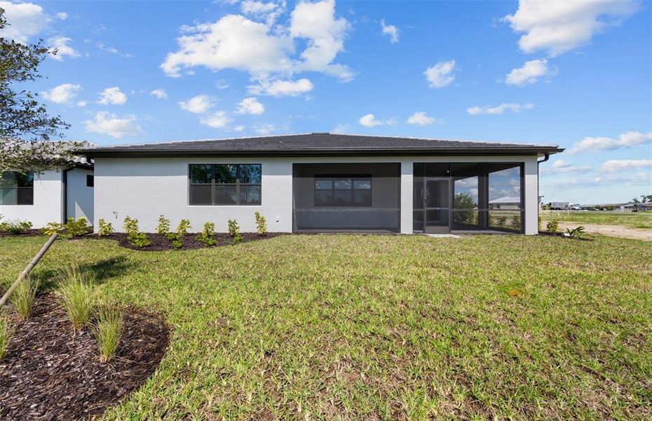 Exterior details and patio area of a home in Arbor Oaks, North Port (Image 1).