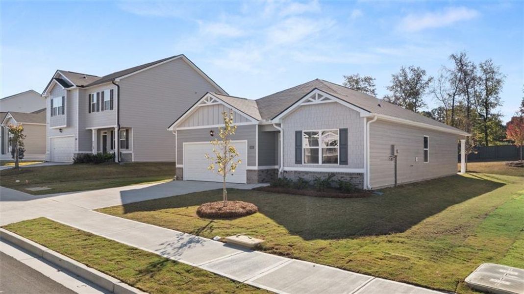 Front exterior of a new home in Jackson Landing, Jefferson, GA, highlighting curb appeal (Image 25).