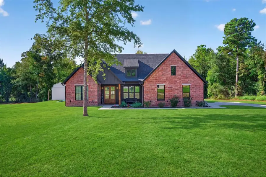 Front exterior of a new home in , Kilgore, TX, highlighting curb appeal (Image 24).