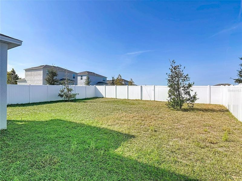 Exterior details and patio area of a home in Parkside at Cherry Lake, Groveland (Image 29).