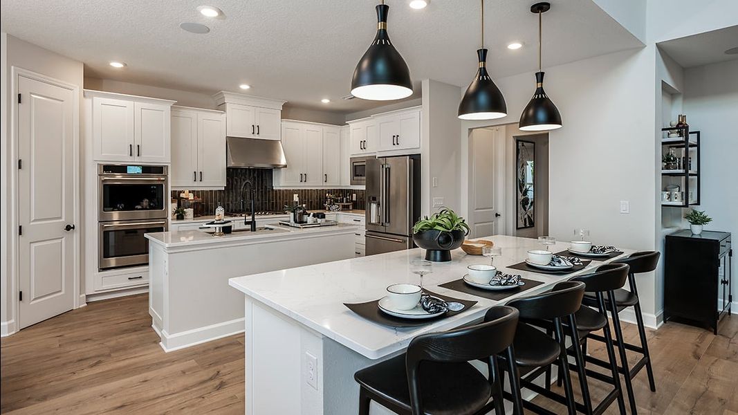 Representative furnished interior of a home built from the Bimini by Taylor Morrison in Ardisia Park, New Smyrna Beach (Image 5).