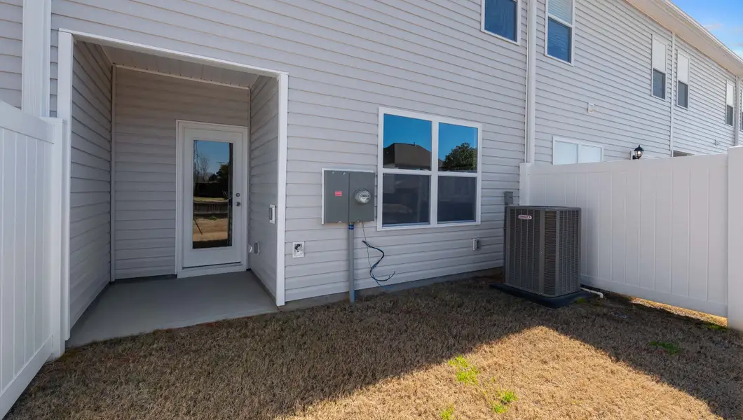 Exterior details and patio area of a home in Covington Village, Greer (Image 3).