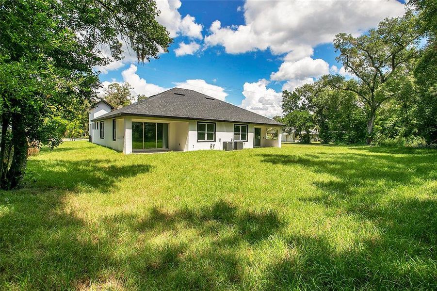 Front exterior of a new home in , Apopka, FL, highlighting curb appeal (Image 42).