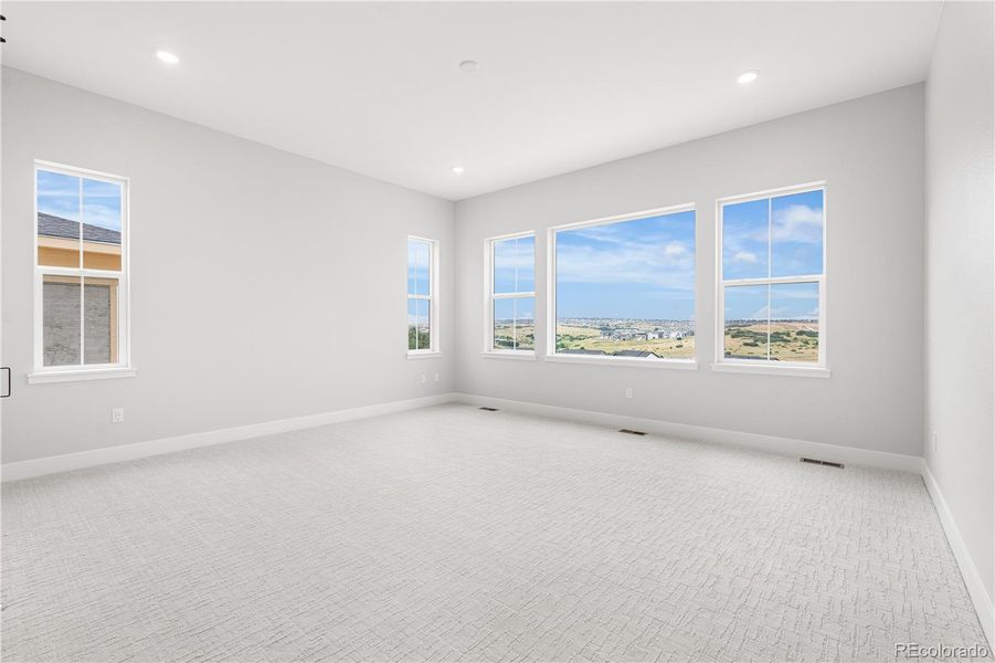 Spacious, unfurnished interior of a new home in Retreat at The Canyons, Castle Pines (Image 32).