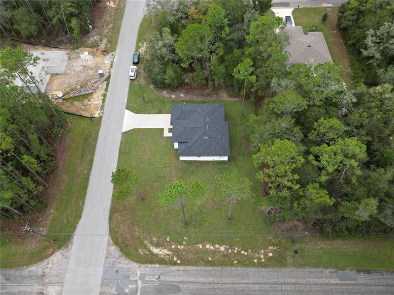 Front exterior of a new home in , Citrus Springs, FL, highlighting curb appeal (Image 26).