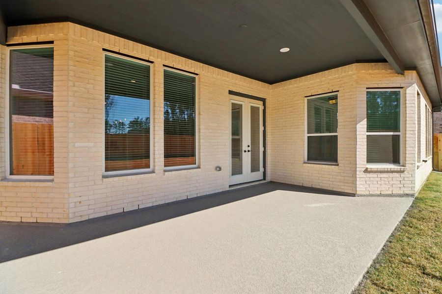 Exterior details and patio area of a home in The Highlands, Porter (Image 21).
