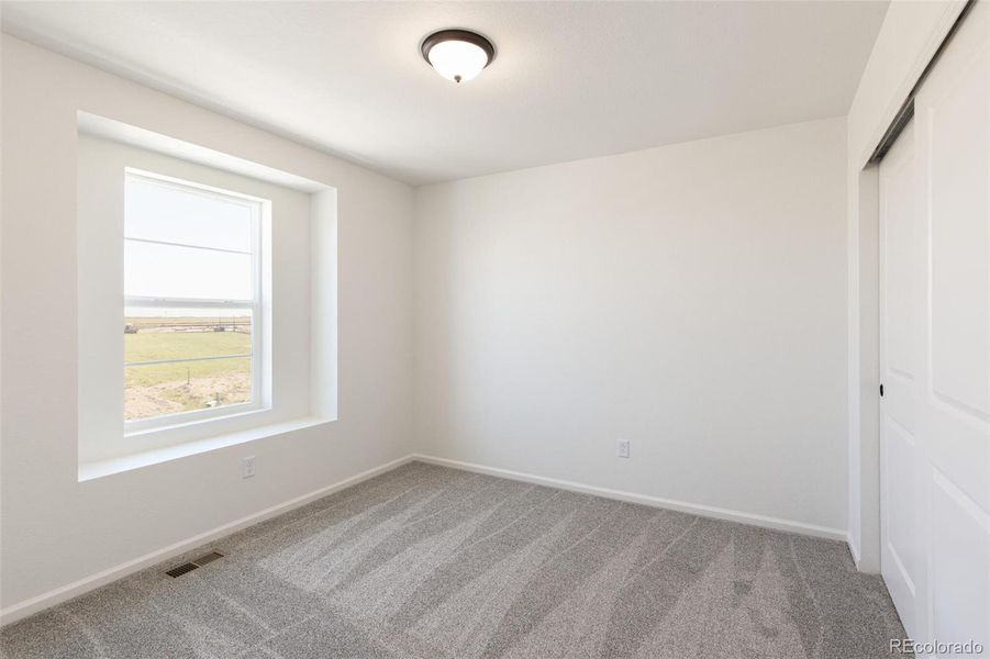 Spacious, unfurnished interior of a new home in Legato, Commerce City (Image 30).