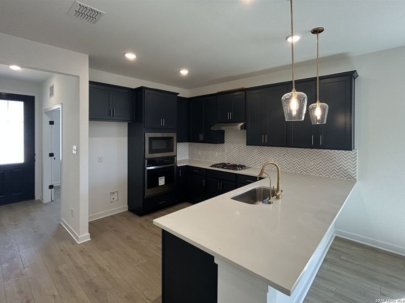Furnished interior view inside a new home in Hennersby Hollow, San Antonio (Image 7).