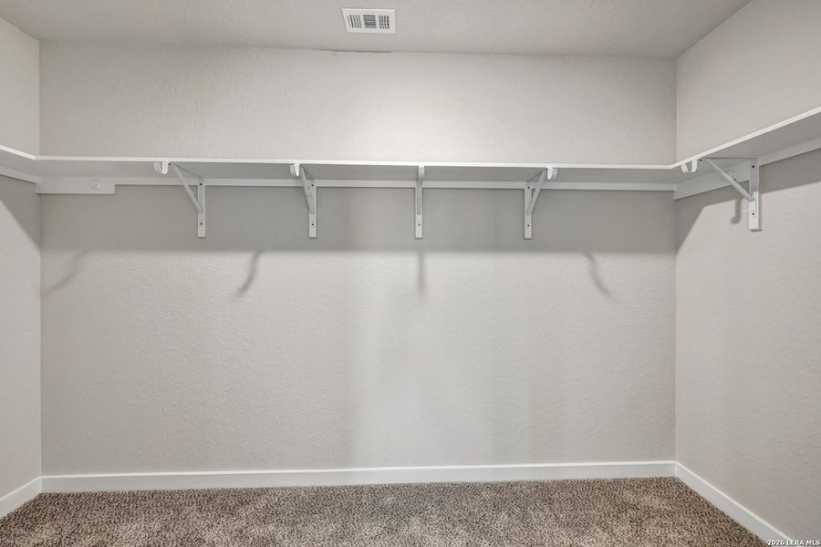 Spacious, unfurnished interior of a new home in Winding Brook, San Antonio (Image 42).