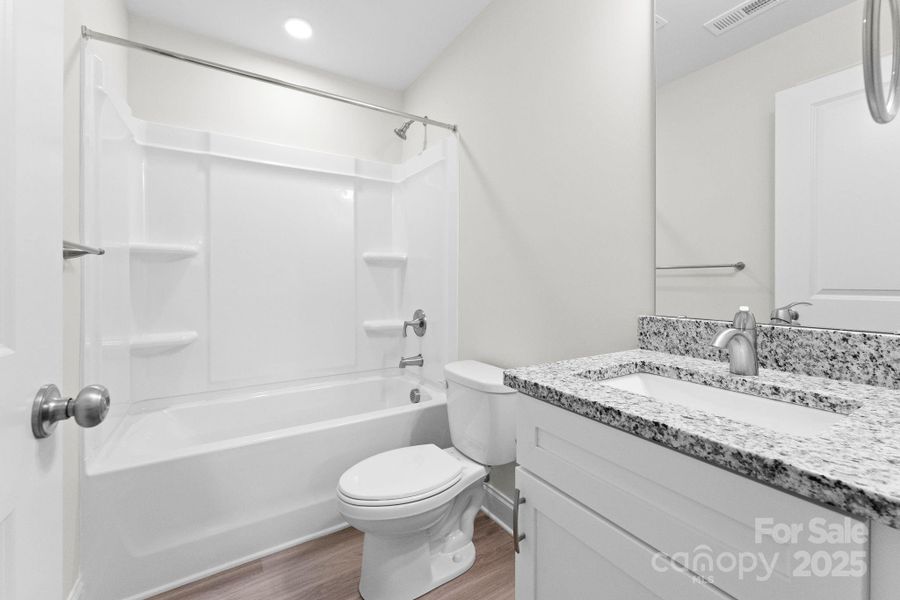 Representative Photo: Guest Bathroom Representative Photo: Guest Bathroom