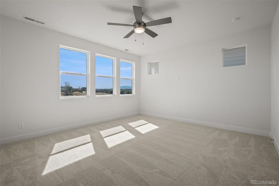Spacious, unfurnished interior of a new home in Trailside at Cottonwood Creek, Colorado Springs (Image 32).