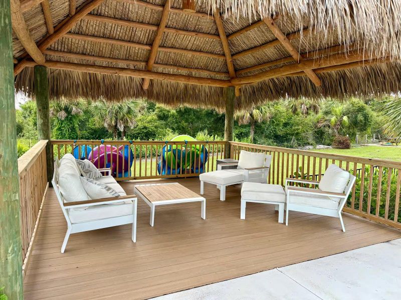 Tiki Hut by pool - main house Tiki Hut by pool - main house