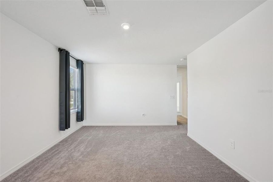 Spacious, unfurnished interior of a new home in Park East: The Manors, Plant City (Image 44). Spacious, unfurnished interior of a new home in Park East: The Manors, Plant City (Image 44).