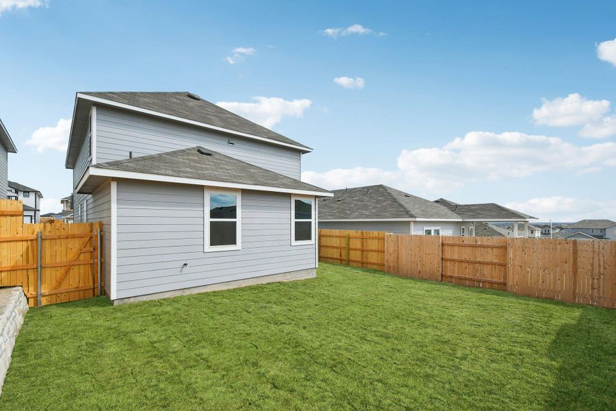 Rear of Home and Private Backyard