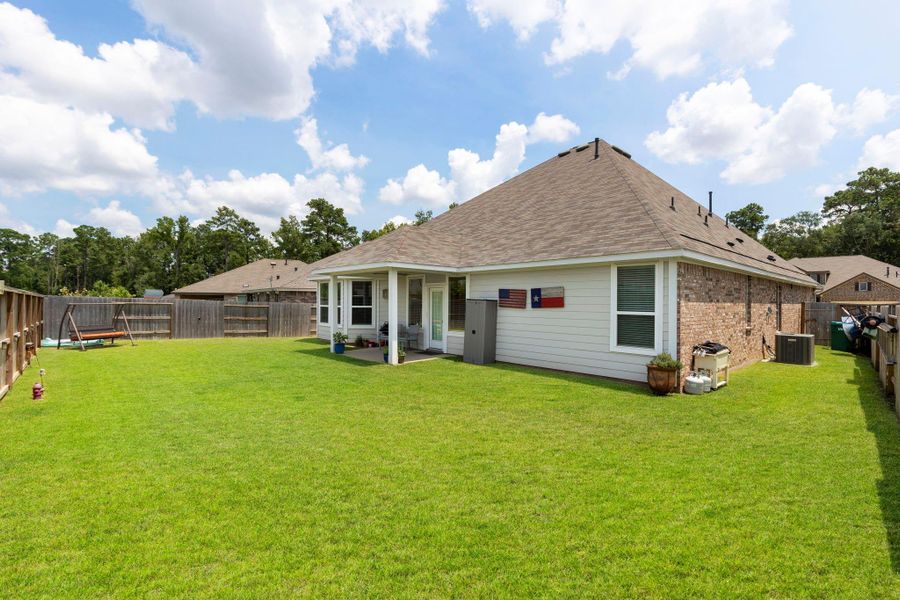 Front exterior of a new home in Moran Ranch, Willis, TX, highlighting curb appeal (Image 19). Front exterior of a new home in Moran Ranch, Willis, TX, highlighting curb appeal (Image 19).