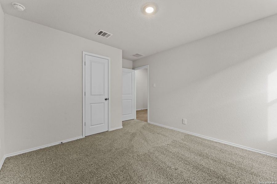 Spacious, unfurnished interior of a new home in Navarro Fields, Seguin (Image 24).