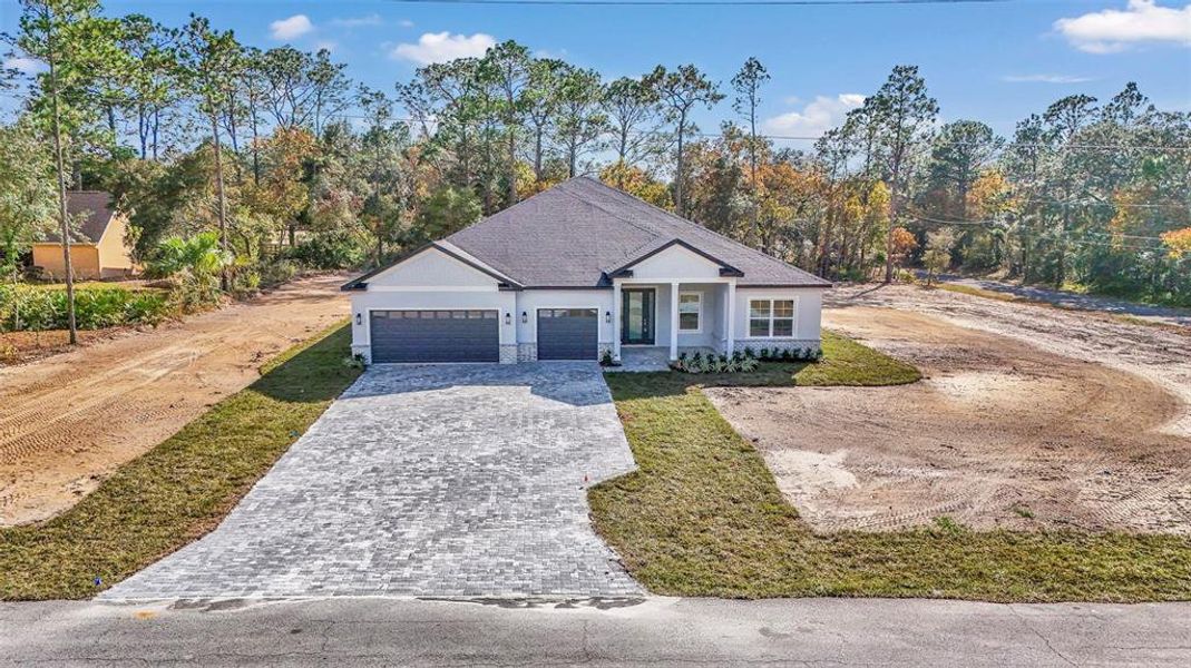 Front exterior of a new home in , Beverly Hills, FL, highlighting curb appeal (Image 21). Front exterior of a new home in , Beverly Hills, FL, highlighting curb appeal (Image 21).