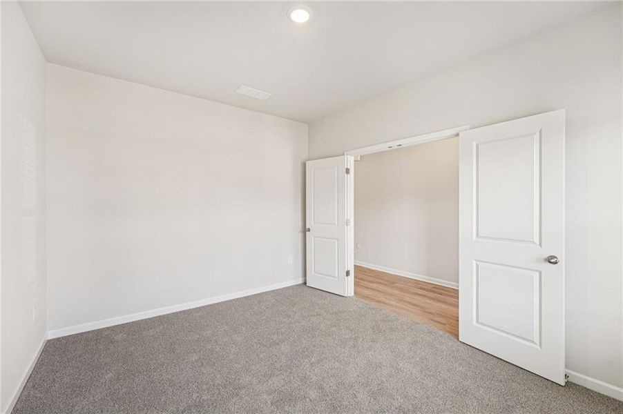 Spacious, unfurnished interior of a new home in Westmont Preserve, Powder Springs (Image 41).